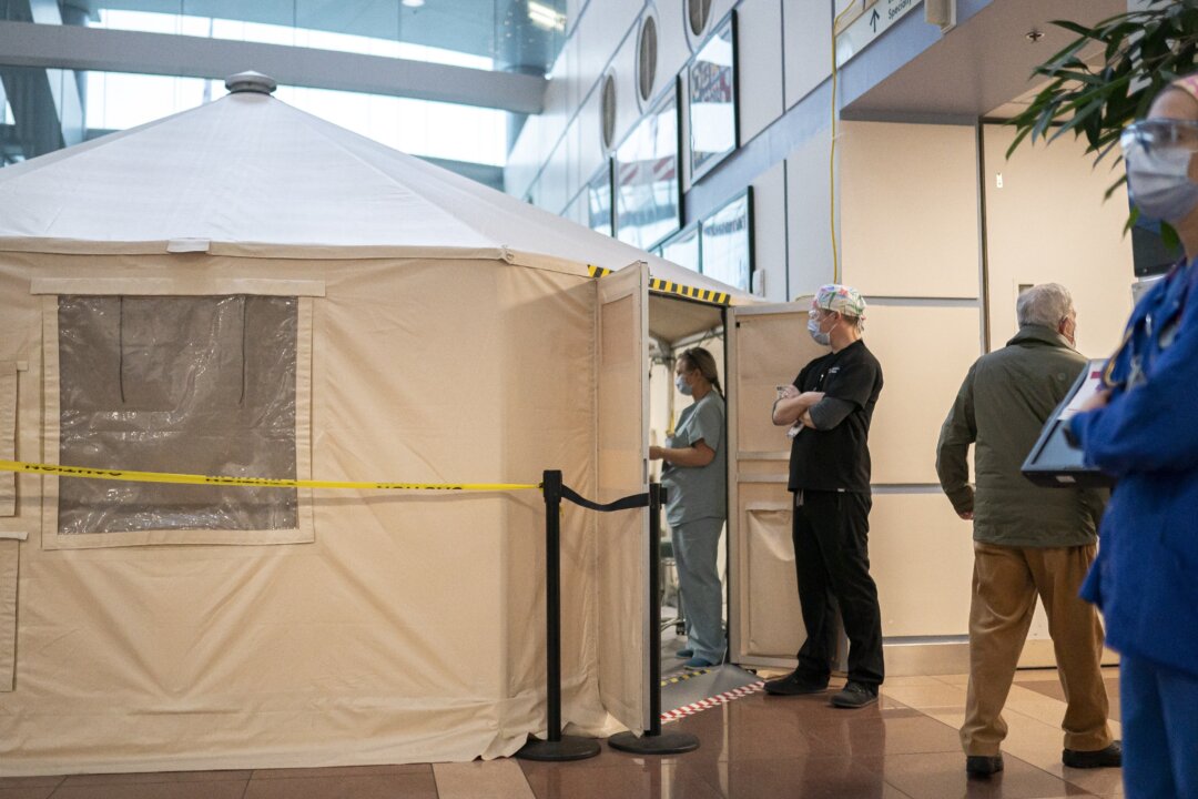Healthcare workers in a healthcare facility in Portland, Ore., in a file image. (Nathan Howard/Getty Images)