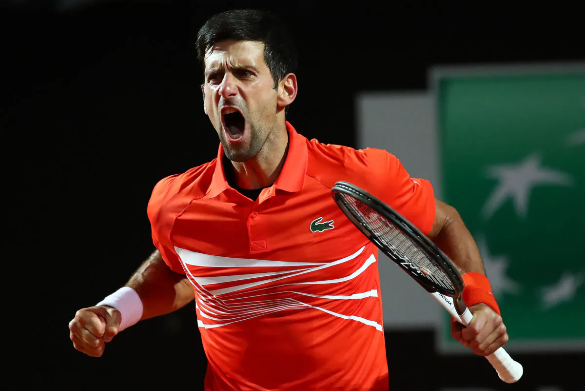 Novak Djokovic of Serbia celebrates against Juan Martin del Potro of Argentina in their Men's Single Quarter Final Match during Day Six of the International BNL d'Italia at Foro Italico on May 17, 2019 in Rome, Italy. (Clive Brunskill/Getty Images)
