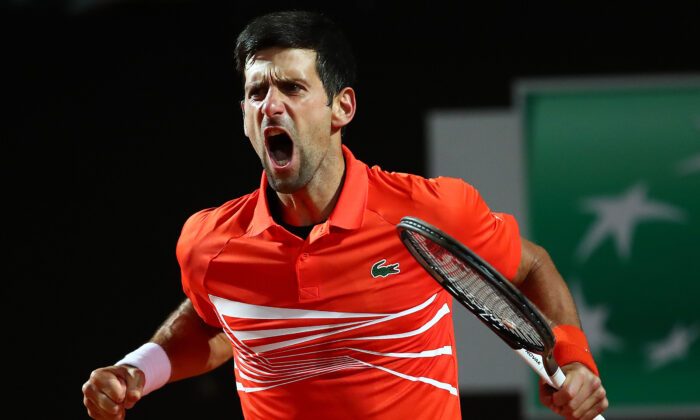 Novak Djokovic of Serbia celebrates against Juan Martin del Potro of Argentina in their Men's Single Quarter Final Match during Day Six of the International BNL d'Italia at Foro Italico on May 17, 2019 in Rome, Italy. (Clive Brunskill/Getty Images)