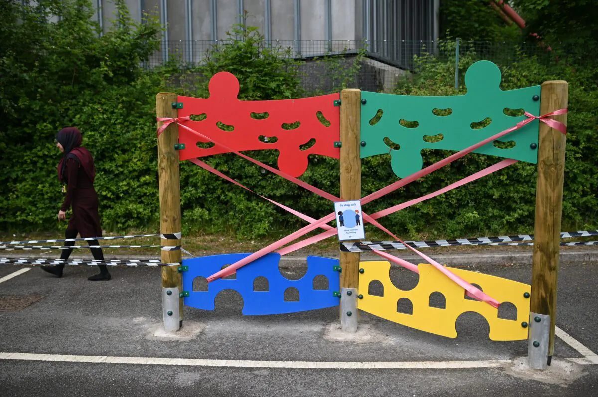 Playground equipment is taped off to prevent use during the COVID-19 pandemic at Brambles Primary Academy in Huddersfield, northern England, on June 4, 2020. (Oli Scarff/AFP via Getty Images)