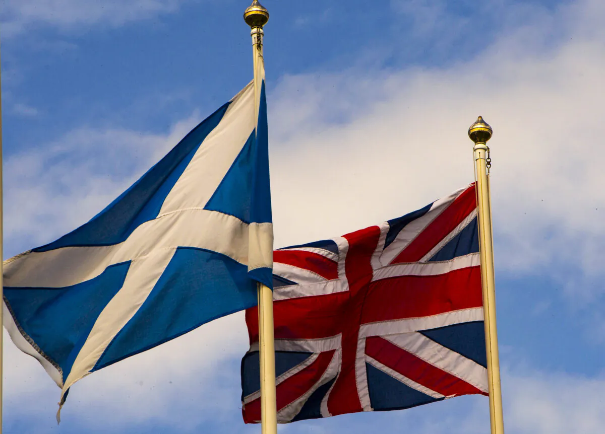 The Scottish Saltire (L) and the Union Flag flutter above Stirling Castle in the historic town of Stirling, central Scotland, on Aug. 7, 2019. (Andy Buchanan/AFP via Getty Images)