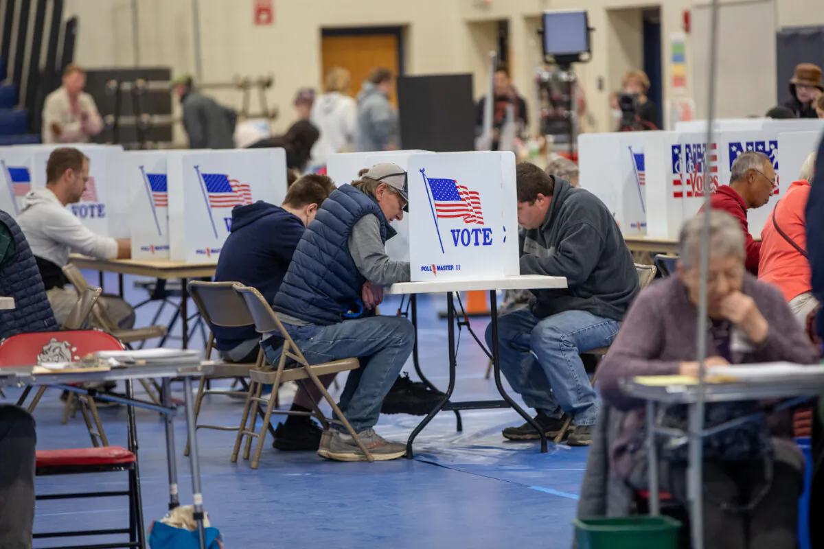 Voters fill out their ballots at Bedford High School on November 08, 2022, in Manchester, New Hampshire. (Scott Eisen/Getty Images)