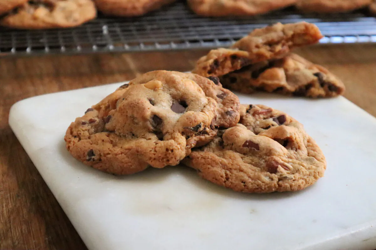 Butterscotch pudding mix is the secret weapon in these ooey-gooey cookies studded with chocolate chips and toasted pecans. (Gretchen McKay/Pittsburgh Post-Gazette/TNS)