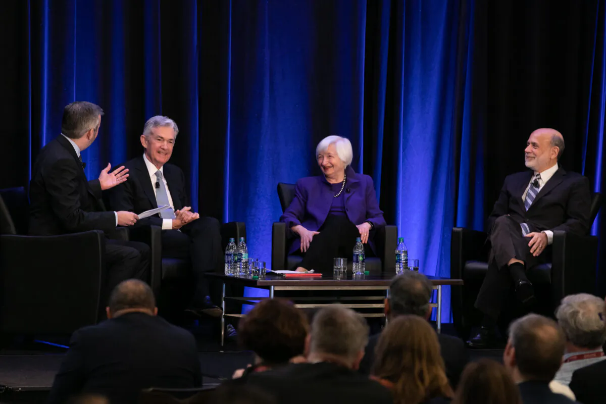 (L-R) Neil Irwin of The New York Times leads Federal Reserve Chair Jerome Powell and former chairs of the Federal Reserve Janet Yellen and Ben Bernanke during a panel discussion at the American Economic Association conference in Atlanta on Jan. 4, 2019. (Jessica McGowan/Getty Images)