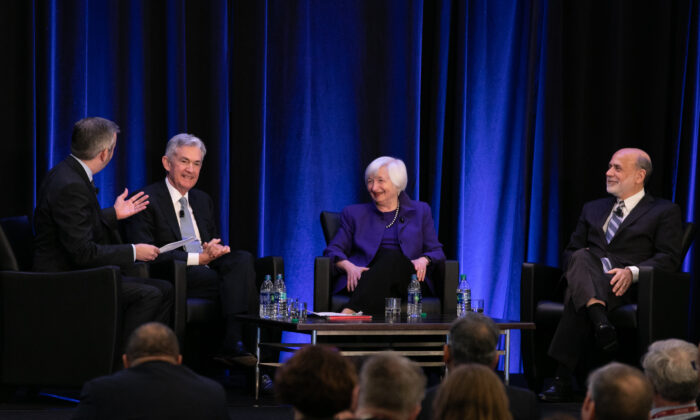(L-R) Neil Irwin of The New York Times leads Federal Reserve Chair Jerome Powell and former chairs of the Federal Reserve Janet Yellen and Ben Bernanke during a panel discussion at the American Economic Association conference in Atlanta on Jan. 4, 2019. (Jessica McGowan/Getty Images)