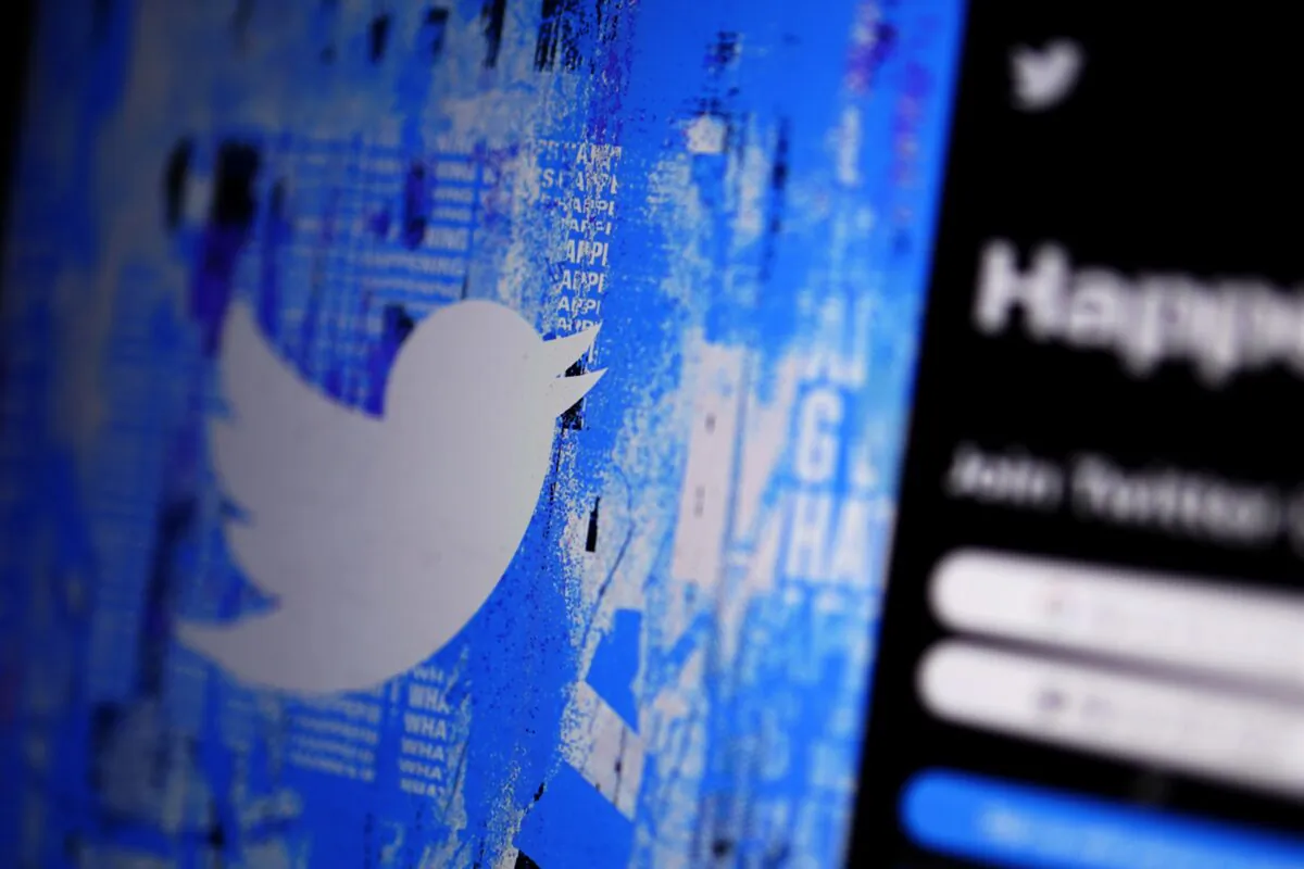 The Twitter splash page on a digital device in San Diego on April 25, 2022. (Gregory Bull/AP Photo)
