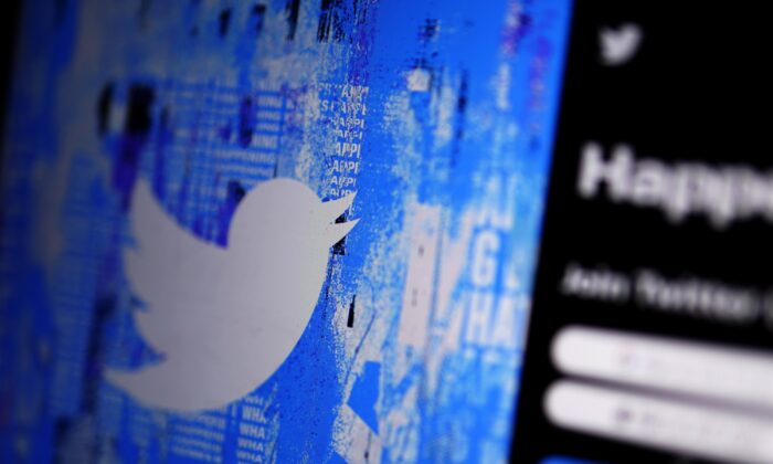 The Twitter splash page on a digital device in San Diego on April 25, 2022. (Gregory Bull/AP Photo)