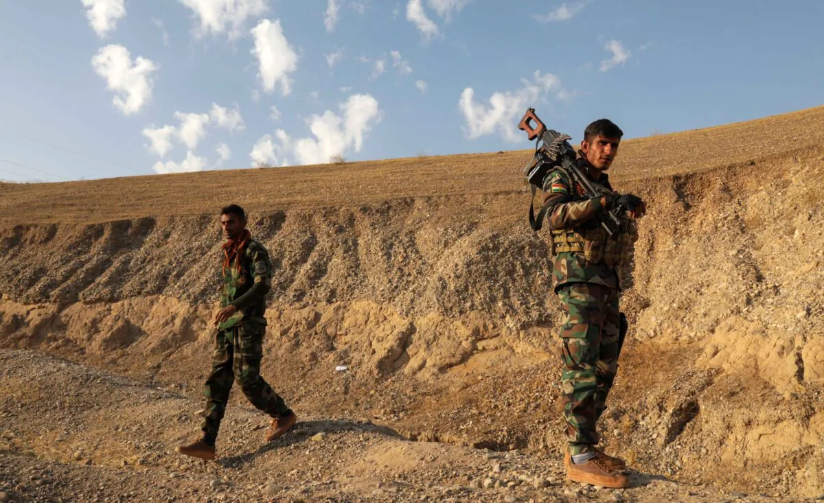 Kurdish Peshmerga fighters affiliated with Iran's separatist Kurdistan Freedom Party (PAK), man a position near the city of Altun Kupri (Perdi), north of Kirkuk, in Iraq's autonomous Kurdistan region, on Nov. 23, 2022. (Safin Hamed/AFP via Getty Images)