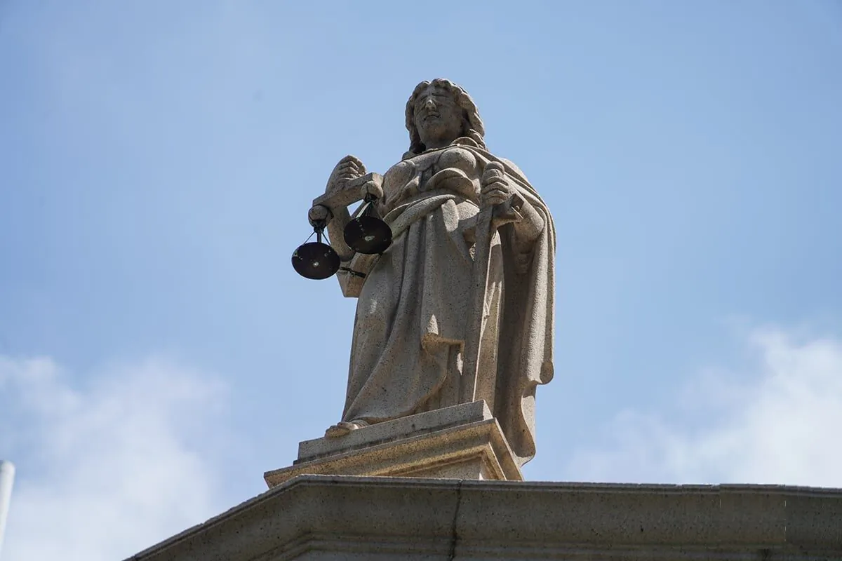 The Hong Kong Department of Justice requests Briefed Out Counsel to sign confirming their role in safeguarding National Security Law (NSL) and observing confidentiality requirements. Scholars criticized this as bringing owls to Athens. (Adrian Yu/The Epoch Times)