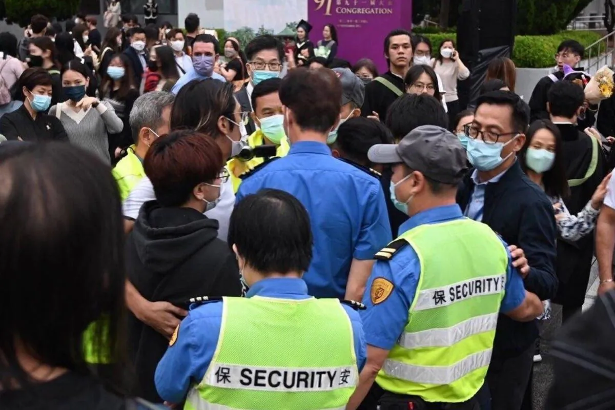 The Chinese University of Hong Kong held a graduation ceremony on Nov. 24. During the ceremony, students made a protest and had an altercation with the security guards present who later called the police. (Facebook picture of University Community Press)