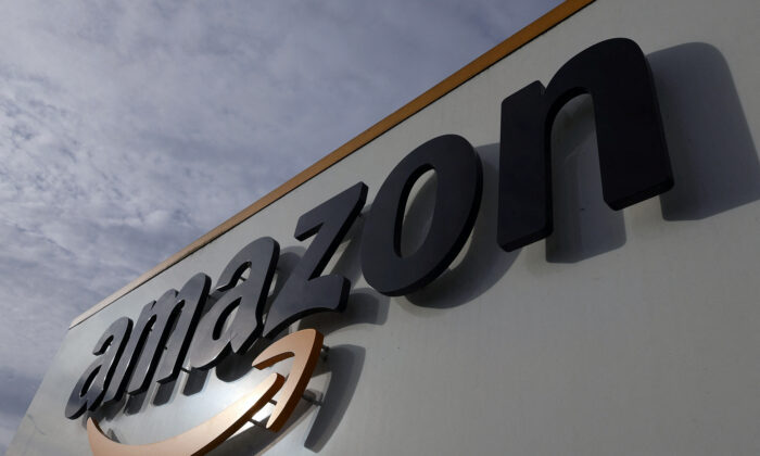 The logo of Amazon at the company logistics center in Lauwin-Planque, northern France, on Nov. 15, 2022. (Pascal Rossignol/Reuters)