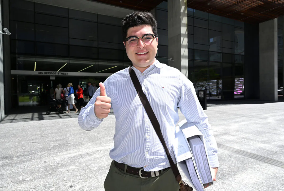 Drew Pavlou is seen arriving at the Brisbane District Court in Brisbane on Nov, 25, 2022. (AAP Image/Darren England)