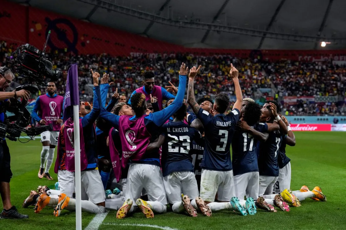 Ecuador's Enner Valencia celebrates with his teammates after scoring his side's first goal during the World Cup group A soccer match between Netherlands and Ecuador, at the Khalifa International Stadium in Doha, Qatar, on Nov. 25, 2022. (Natacha Pisarenko/AP Photo)