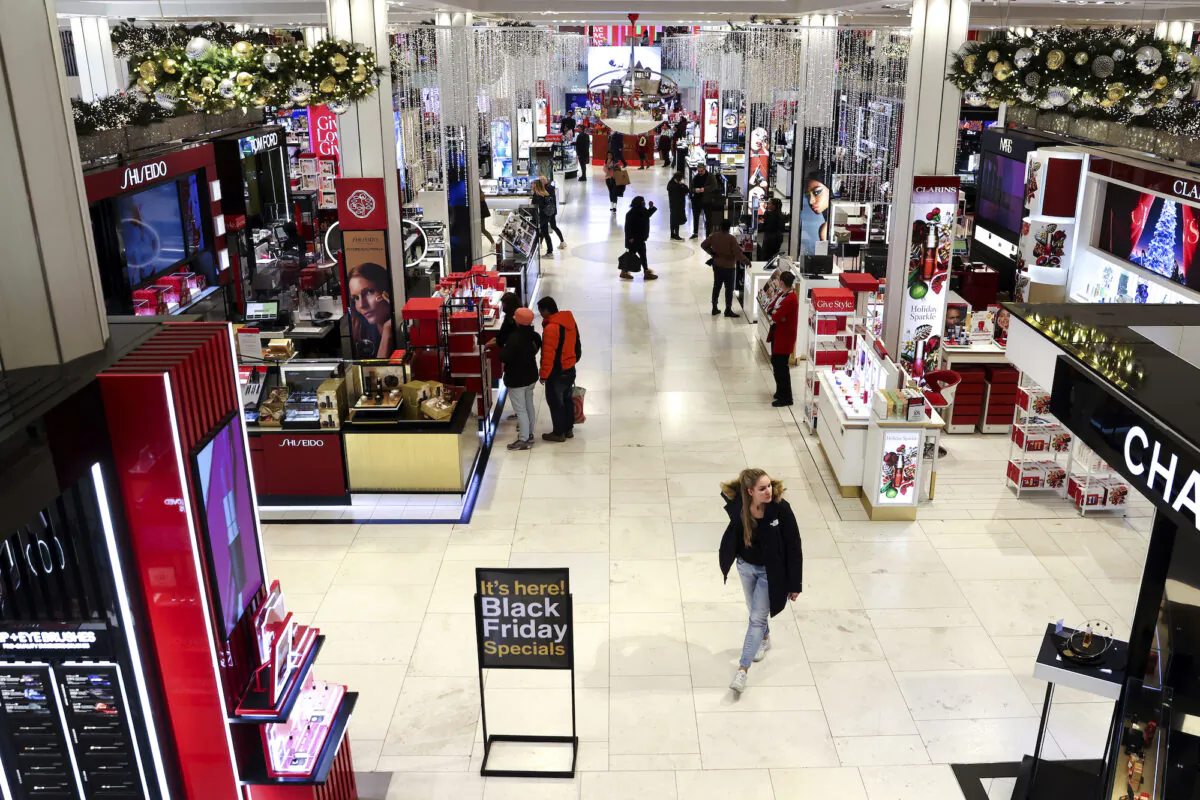 Customers shop in a nearly-empty Macy's early on Black Friday in New York on Nov. 25, 2022. (Julia Nikhinson/AP Photo)