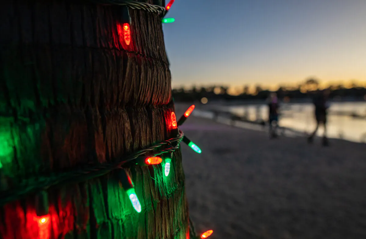 People participate in the 53 annual "Lighting of the Bay" at The Newport Dunes Resort in Newport Beach, Calif., on Nov. 25, 2022. (John Fredricks/The Epoch Times)