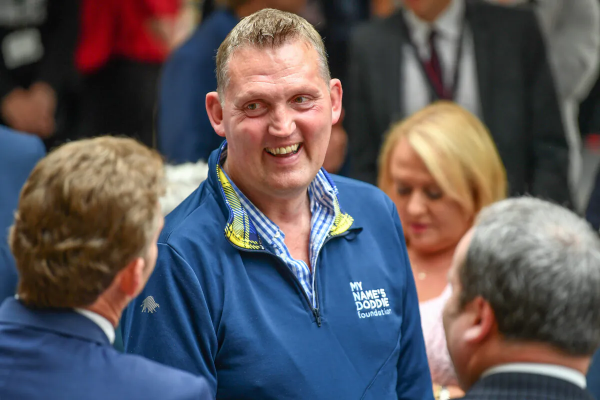 Scottish Rugby player Doddie Weir visits the Scottish Parliament, to be present for Rachael Hamilton MSP’s debate in the Scottish Parliament on their joint campaign for automatic access to the Blue Badge Scheme for people with MND, on Sept.26, 2019. (Jeff J Mitchell/Getty Images)
