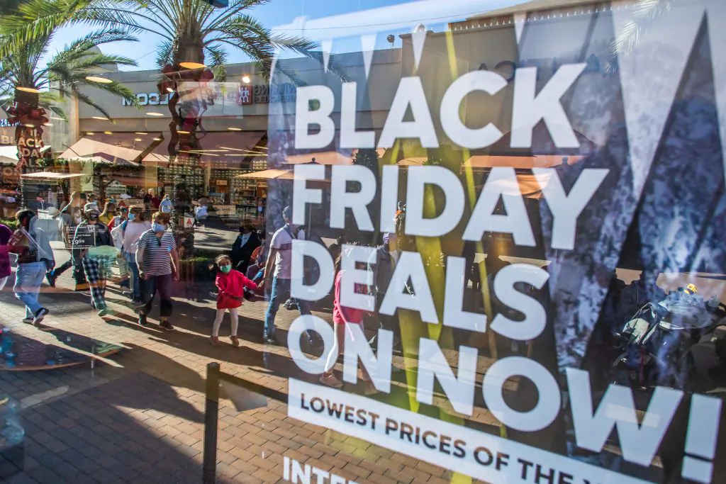 Shoppers walk around Citadel Outlets in Torrance, Calif., on Black Friday, Nov. 26, 2021. - Known as Black Friday, the day after Thanksgiving marks the beginning of the holiday shopping season, with many retailers opening their doors on Thursday evening. (Apu Gomes/AFP via Getty Images)