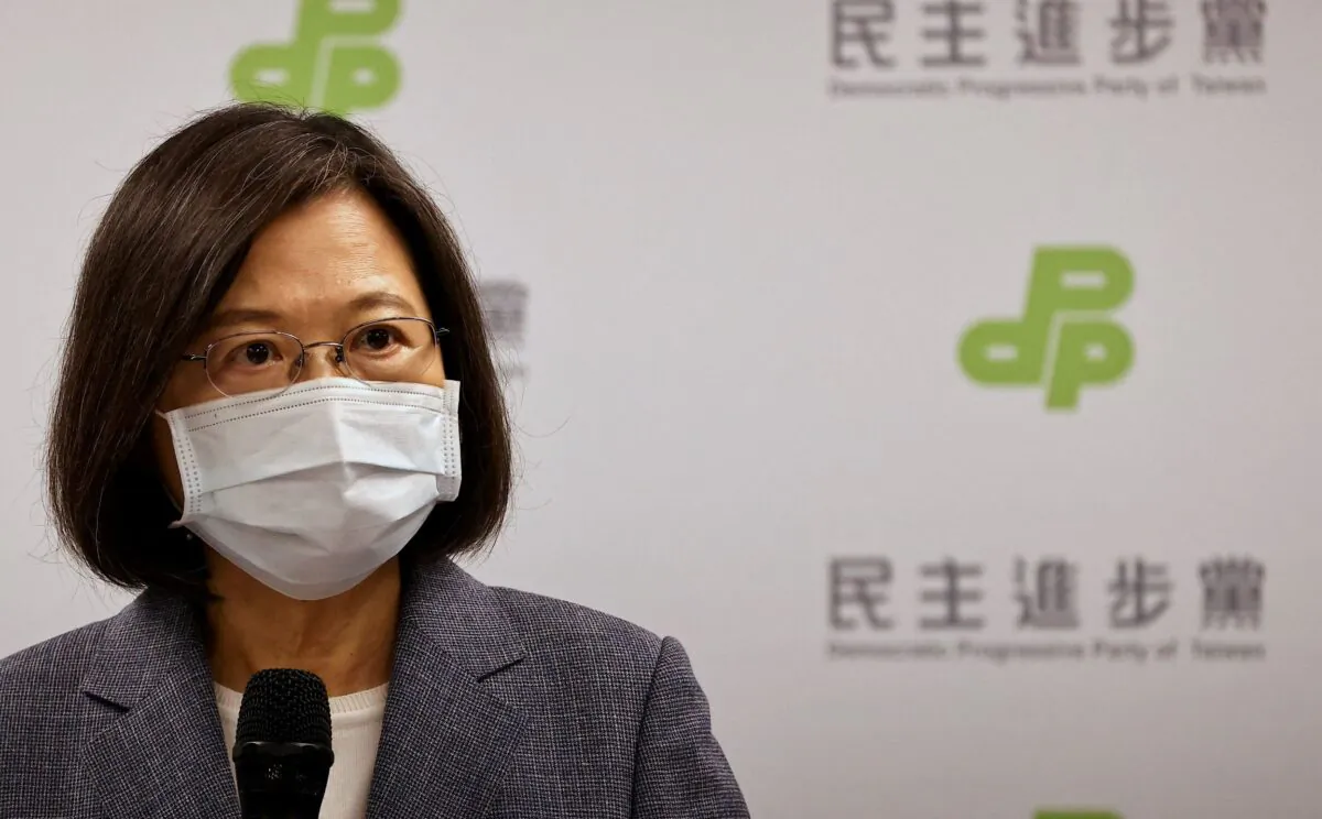 Taiwanese President Tsai Ing-wen announces her resignation as Democratic Progressive Party chair to take responsibility for the party's performance in the local elections in Taipei, Taiwan, on Nov. 26, 2022. (Ann Wang/Reuters)