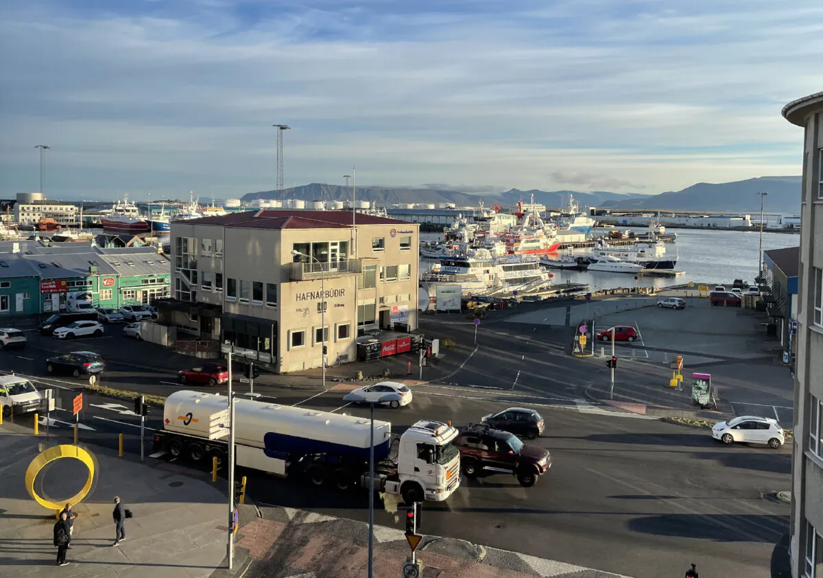 Sunrise over Reykjavik Harbor is a busy time as boats prepare for whale-watching adventures. (Photo courtesy of Lesley Frederikson)