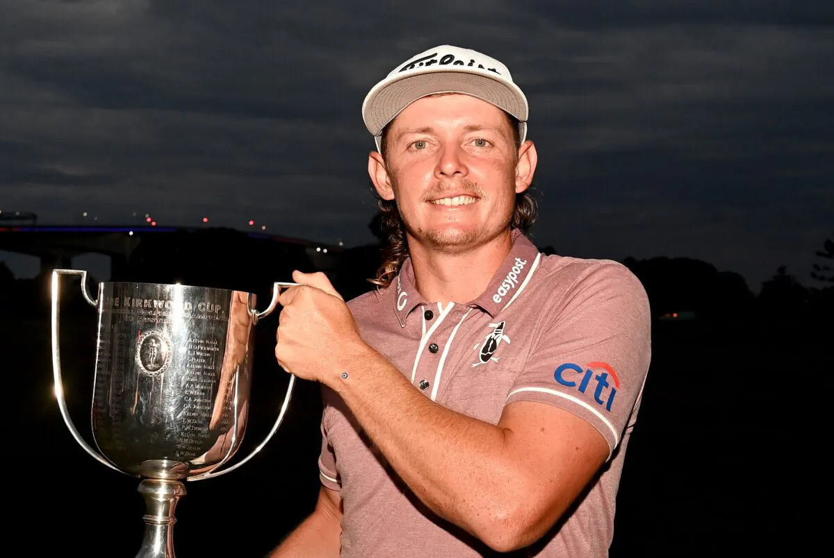 Cameron Smith of Australia celebrates victory as he holds the Kirkwood Cup during Day 4 of the 2022 Australian PGA Championship at the Royal Queensland Golf Club in Brisbane, Australia, on Nov. 27, 2022. (Bradley Kanaris/Getty Images)
