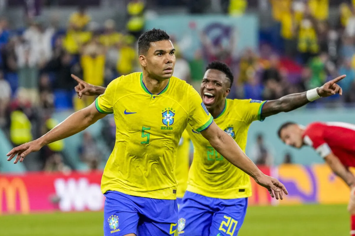Brazil's Casemiro celebrates after scoring his side's opening goal during the World Cup group G soccer match between Brazil and Switzerland, at the Stadium 974 in Doha, Qatar, on Nov. 28, 2022. (Andre Penner/AP Photo)