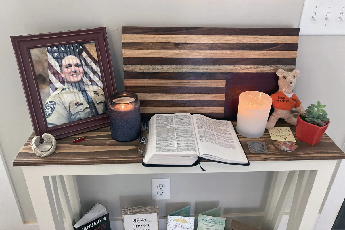 A display dedicated to Jan. 6 detainee Ronald Colton McAbee just inside the entrance to his Tennessee home. (Joseph Hanneman/The Epoch Times)