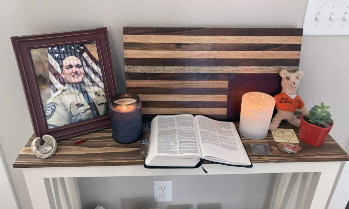 A display dedicated to Jan. 6 detainee Ronald Colton McAbee just inside the entrance to his Tennessee home. (Joseph Hanneman/The Epoch Times)