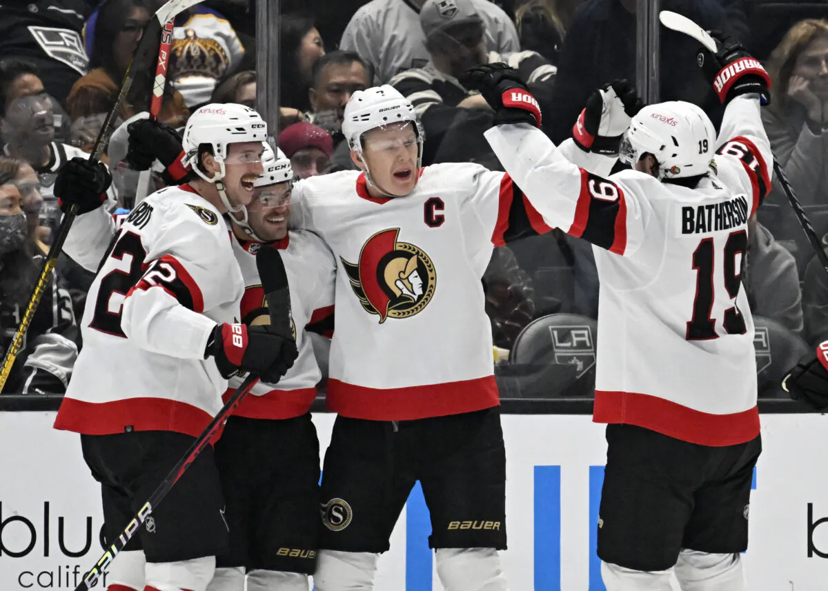 Ottawa Senators celebrate a goal against the Los Angeles Kings during the second period in an NHL hockey game in Los Angeles on Nov. 27, 2022. (John McCoy/AP Photo)