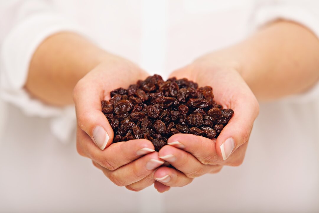 The company we keep can certainly influence our food choices, such as opting for raisins over candy. (Dreamstime/TNS)