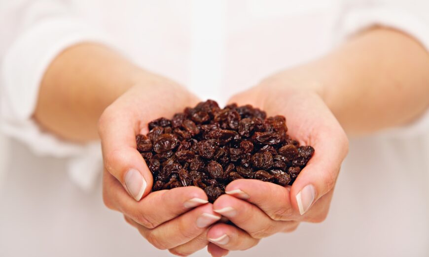 The company we keep can certainly influence our food choices, such as opting for raisins over candy. (Dreamstime/TNS)