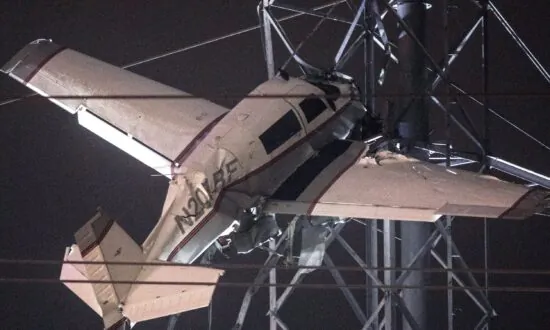 Crews Rescue 2 From Plane Caught in Power Lines in Maryland