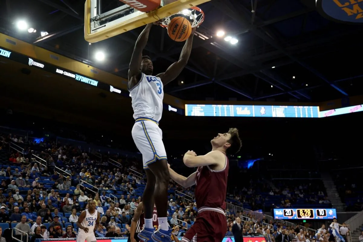 UCLA Bruins forward Adem Bona (3) dunks the ball against Bellarmine Knights forward Langdon Hatton (12) during the first half at Pauley Pavilion in Los Angeles, Nov. 27, 2022. (Kiyoshi Mio/USA TODAY Sports via Field Level Media)