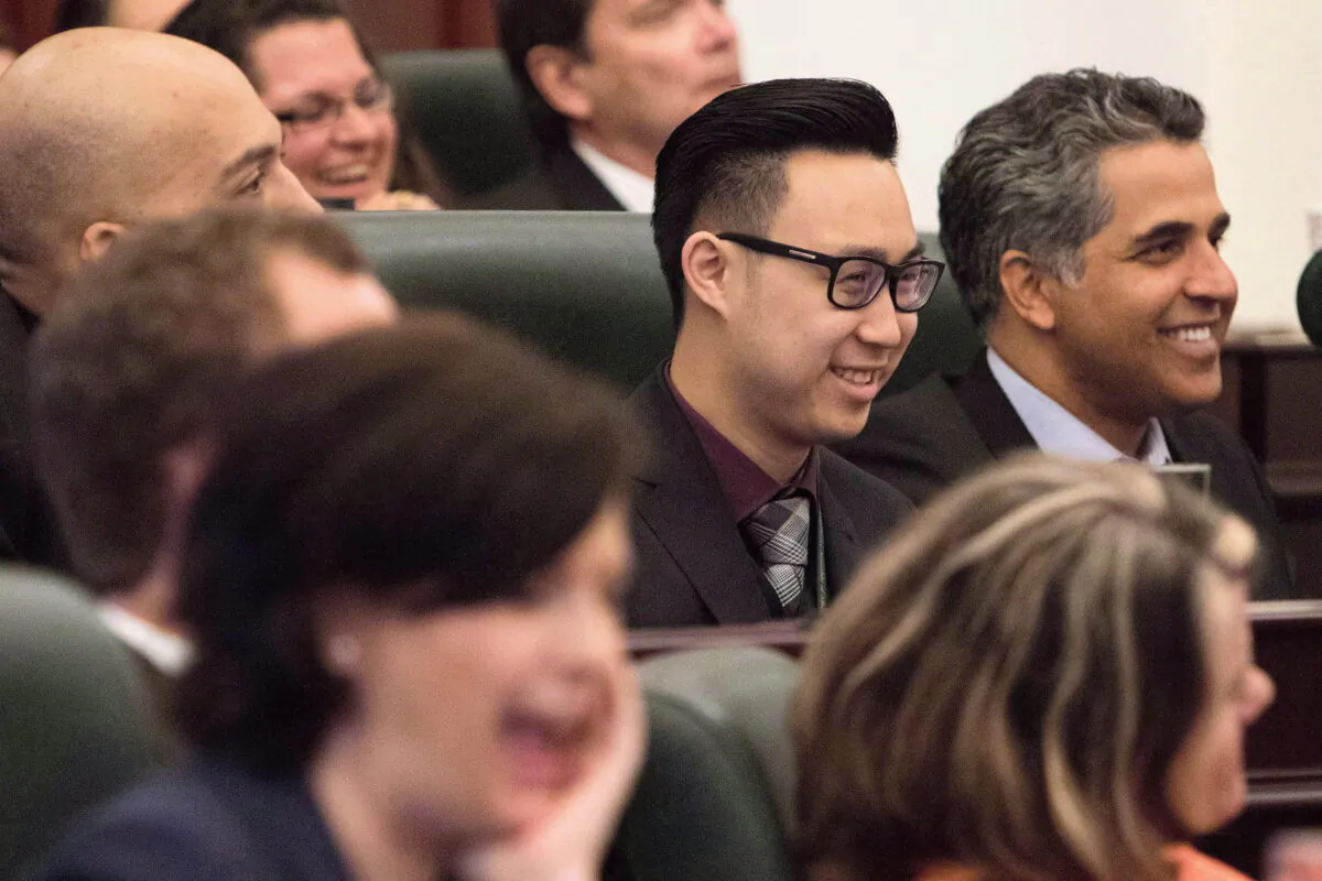 Edmonton-Southwest MLA Thomas Dang (C) pictured on May 12, 2015. (Amber Bracken/The Canadian Press)