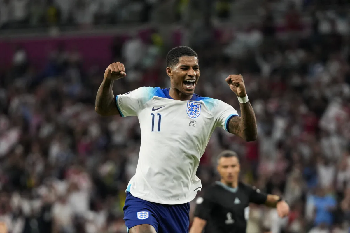 England's Marcus Rashford celebrates after scoring his side's third goal during the World Cup group B soccer match between England and Wales, at the Ahmad Bin Ali Stadium in Al Rayyan , Qatar, on Nov. 29, 2022. (Frank Augstein/AP Photo)