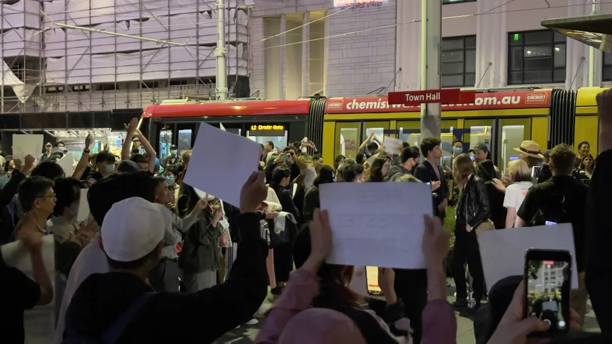 Over 100 Chinese students organized a protest to oppose the CCP's "Zero-COVID" policy and dictatorial rule at Town Hall, Sydney, on Nov. 28, 2022. (Ling Xiao/ Epoch Times)