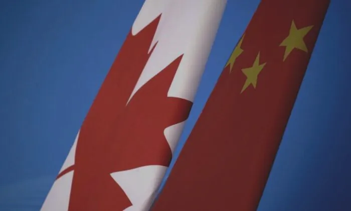 Flags of Canada and China are placed for the first China-Canada economic and financial strategy dialogue in Beijing on Nov. 12, 2018. (Jason Lee/The Associated Press)