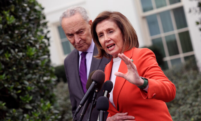 Senate Majority Leader Charles Schumer (D-N.Y.) and Speaker of the House Nancy Pelosi (D-Calif.) speak to reporters outside the White House in Washington on Nov. 29, 2022. (Kevin Dietsch/Getty Images)