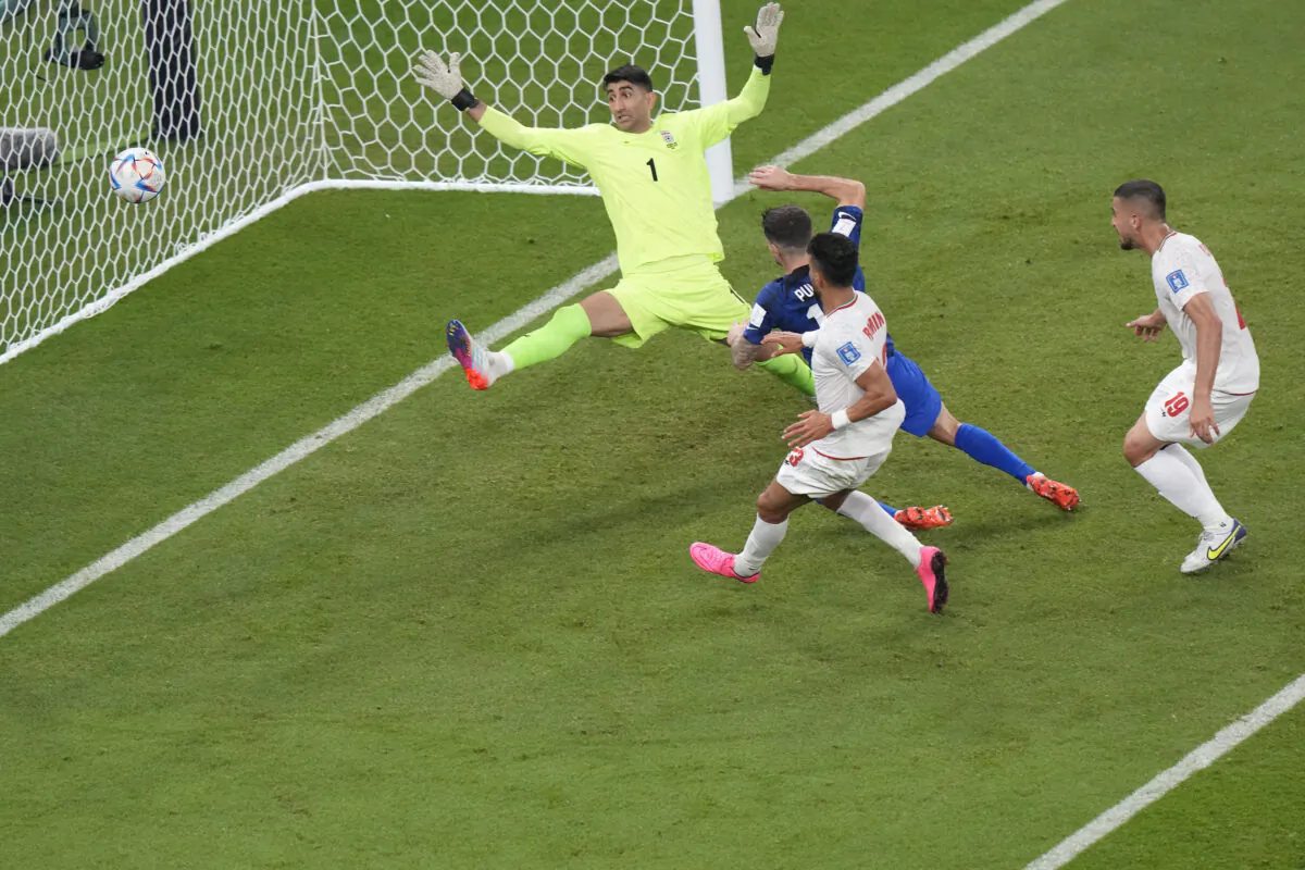 Christian Pulisic of the United States scores his side's opening goal during the World Cup group B soccer match between Iran and the United States at the Al Thumama Stadium in Doha, Qatar, on Nov. 29, 2022. (Luca Bruno/AP Photo)