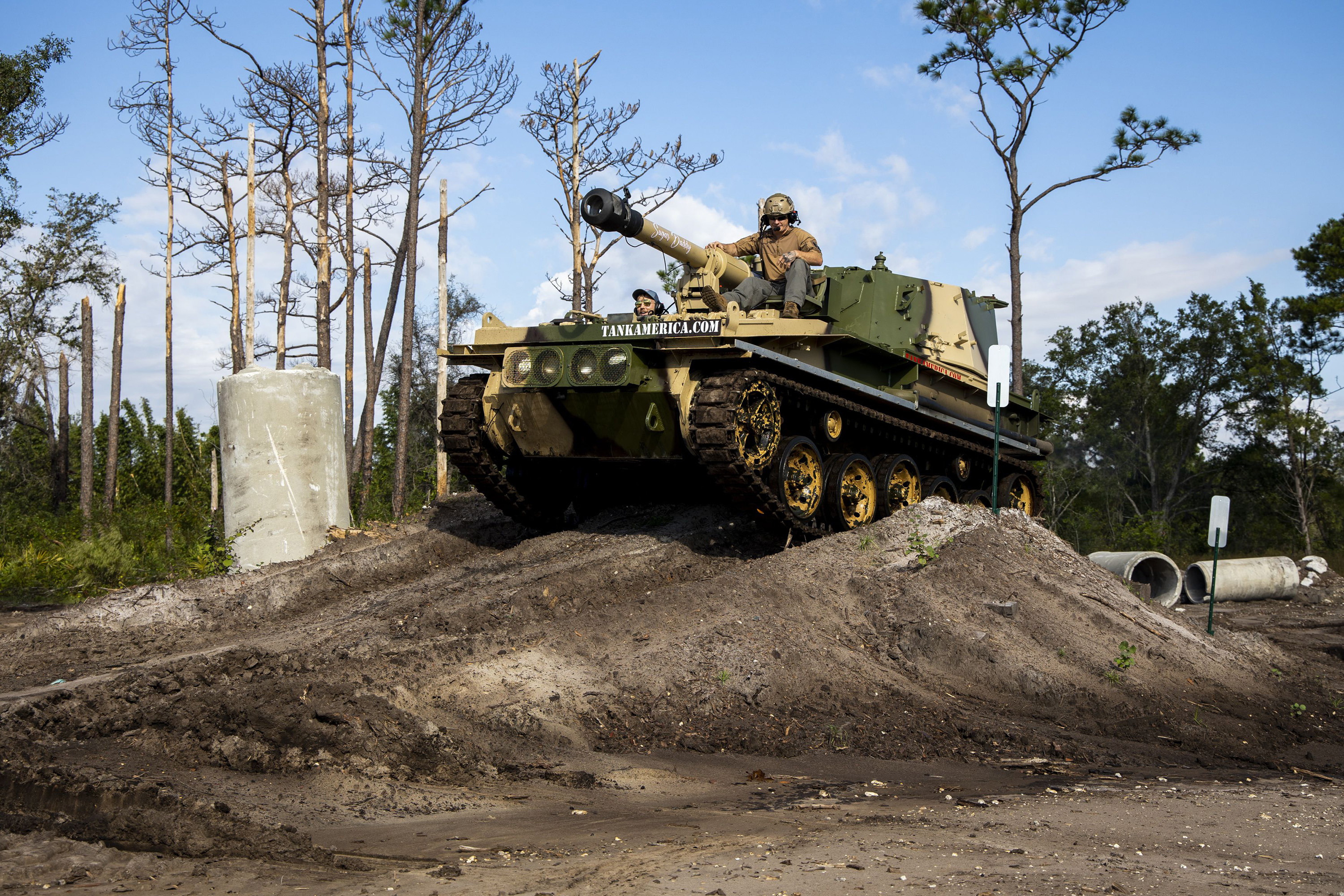Visitors can get behind the controls of a 17-ton FV433 Abbot tank at Tank America in Orlando, Florida.