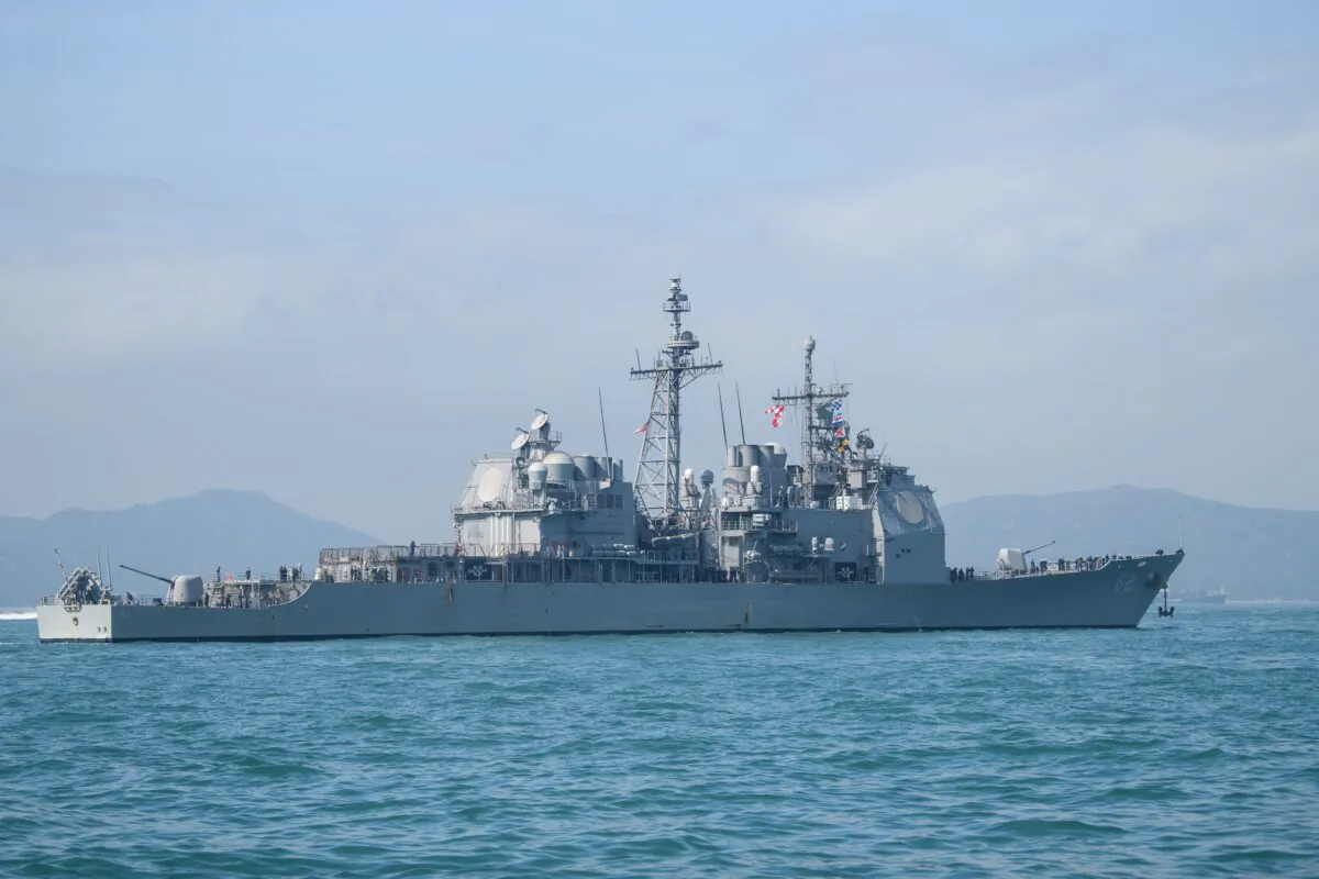 The U.S. Navy's USS Chancellorsville (CG-62) guided missile destroyer during a joint port visit with the USS Ronald Reagan (CVN-76) aircraft carrier (not seen) in Hong Kong on Nov. 21, 2018. (Anthony Wallace/AFP via Getty Images)