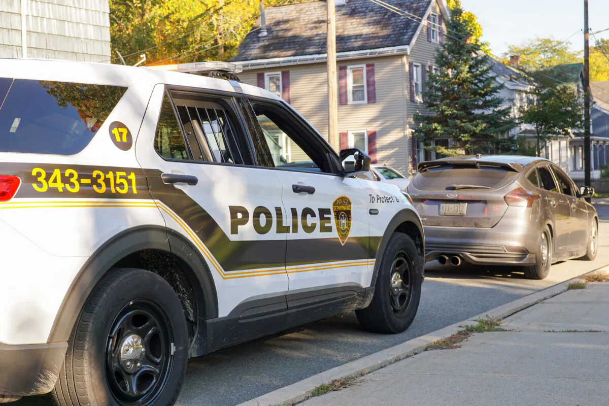 A police officer stops a vehicle in Middletown, N.Y., on Oct. 16, 2022. (Cara Ding/The Epoch Times)