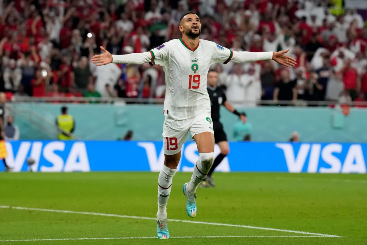 Morocco's Youssef En-Nesyri celebrates after he scored his side's second goal during the World Cup group F soccer match between Canada and Morocco at the Al Thumama Stadium in Doha, Qatar, on Dec. 1, 2022. (Natacha Pisarenko/AP Photo)