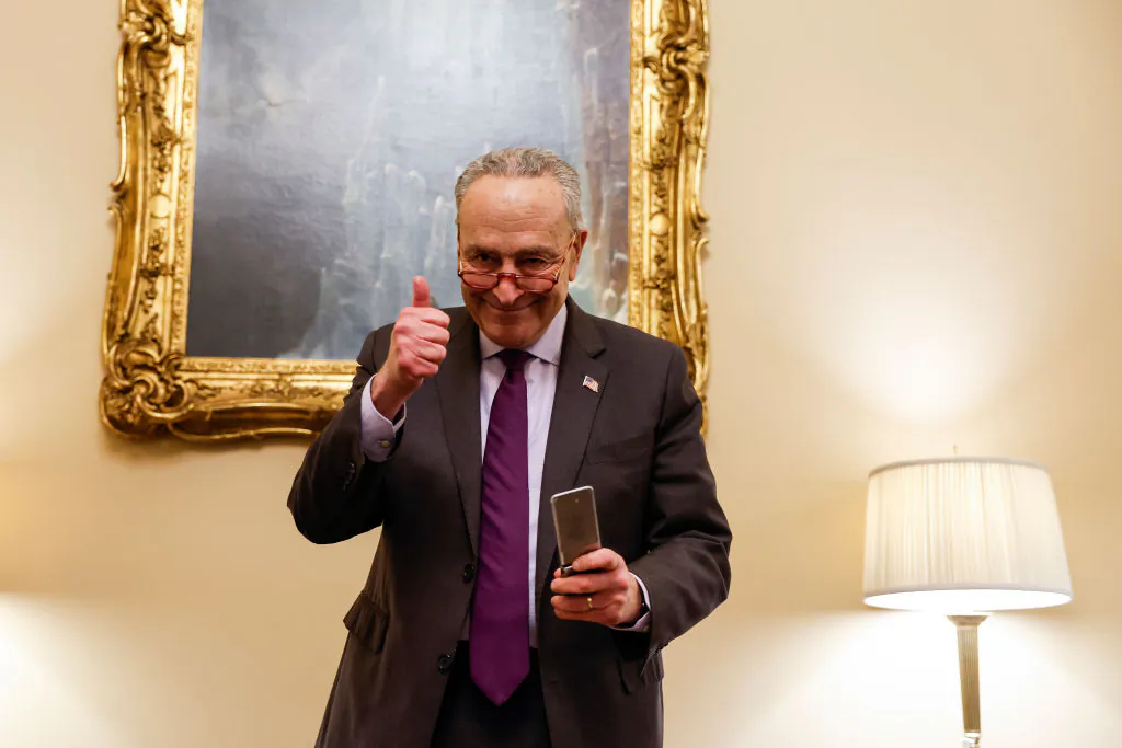 Senate Majority Leader Chuck Schumer (D-N.Y.) gives a thumbs up after speaking on the phone with his daughter Alison, and Alison’s wife from his office after the Senate voted on the "Respect for Marriage" Act at the Capitol Building in Washington, on Nov. 29, 2022. (Anna Moneymaker/Getty Images)