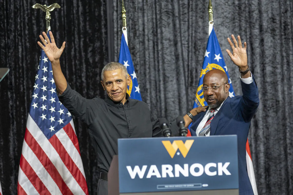 Former President Barack Obama (L) campaigns with Sen. Raphael Warnock (D-Ga.) at Pullman Yards in Atlanta on Dec. 1, 2022. (Courtesy of Phil Mistry/PHIL FOTO)