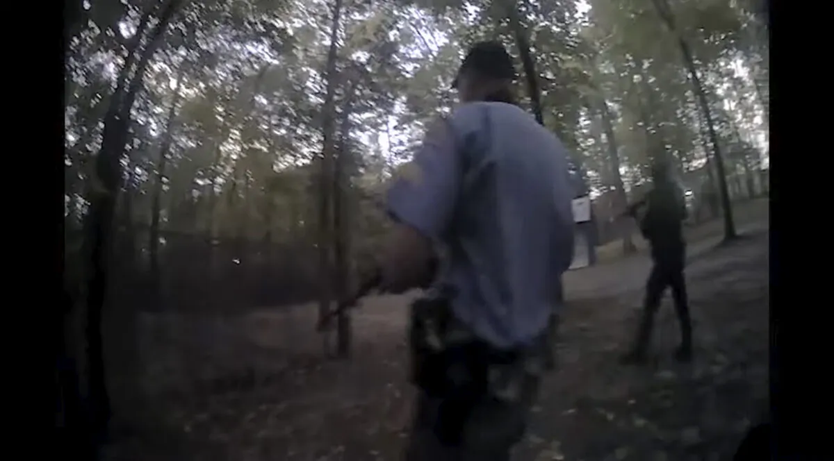 A shootout that nonfatally struck one officer in a still from police body camera footage released on Dec. 1, 2022. (Raleigh Police Department via AP)