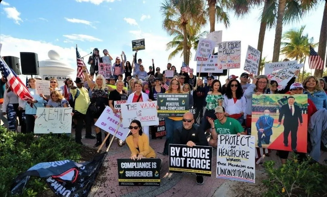 Florida Fathers for Freedom members and others gather on Jan. 23, 2022, in Fort Lauderdale, Fla., at a "Defeat the Mandate" rally to protest forced masking. (Courtesy of Florida Fathers for Freedom)