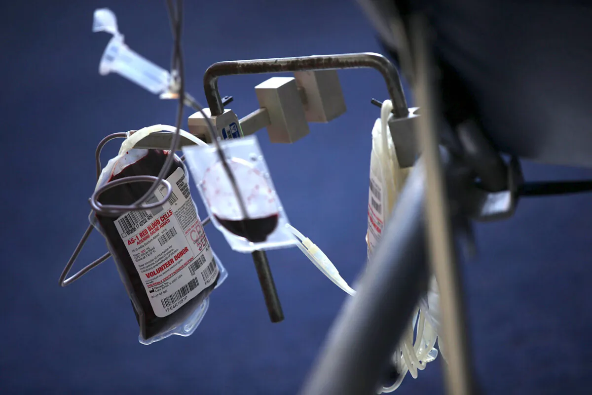 Blood is collected from a donor into a bag during a blood drive on Capitol Hill in Washington, DC on June 20, 2017. (Alex Wong/Getty Images)