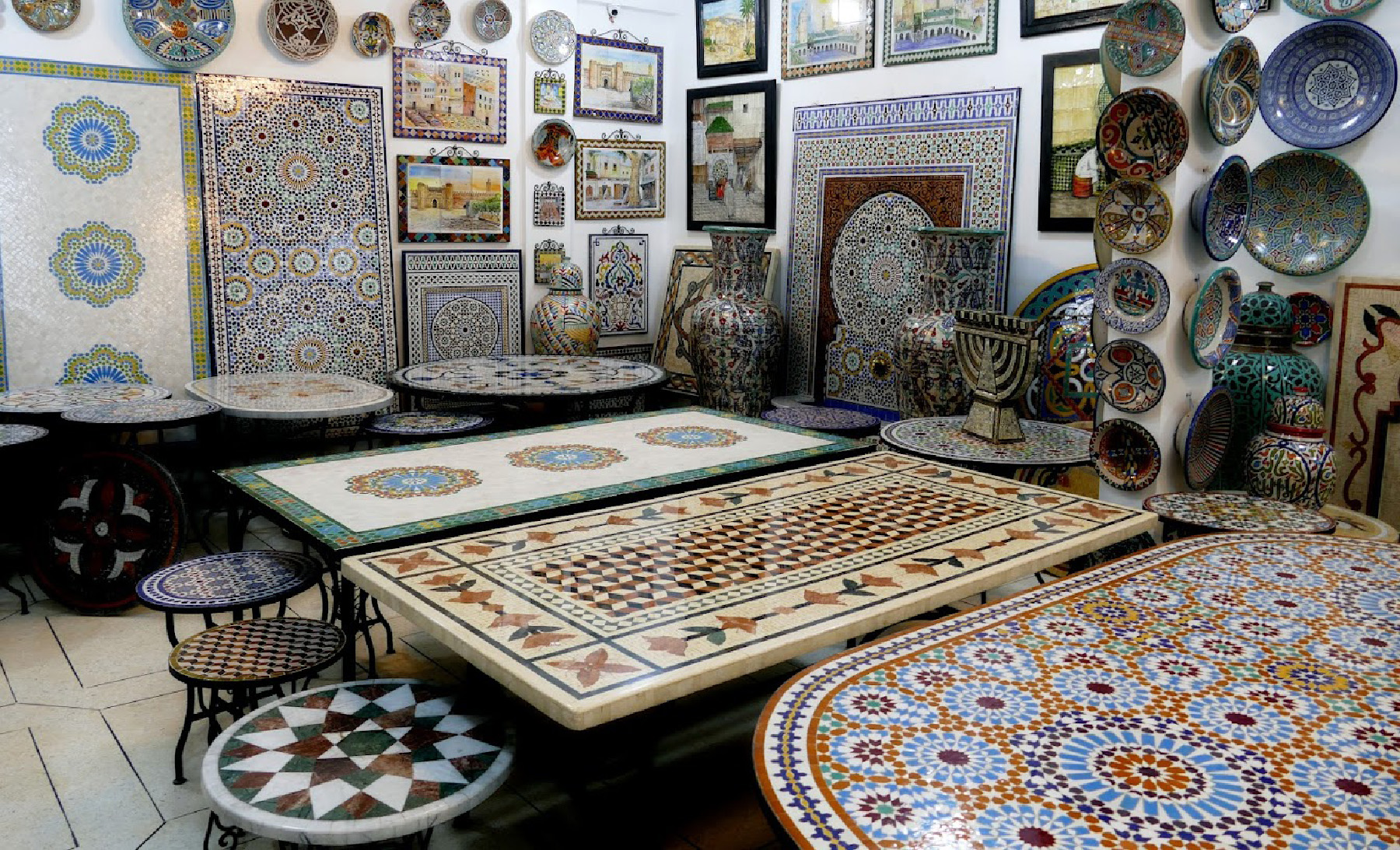 Pieces for sale at a pottery facility in Fes, Morocco, range from tables and pots to fountains and menorahs.
