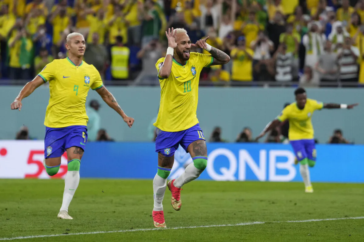 Brazil's Neymar celebrates after scoring his side's second goal during the World Cup round of 16 soccer match between Brazil and South Korea, at the Education City Stadium in Al Rayyan, Qatar, on Dec. 5, 2022. (Manu Fernandez/AP Photo)