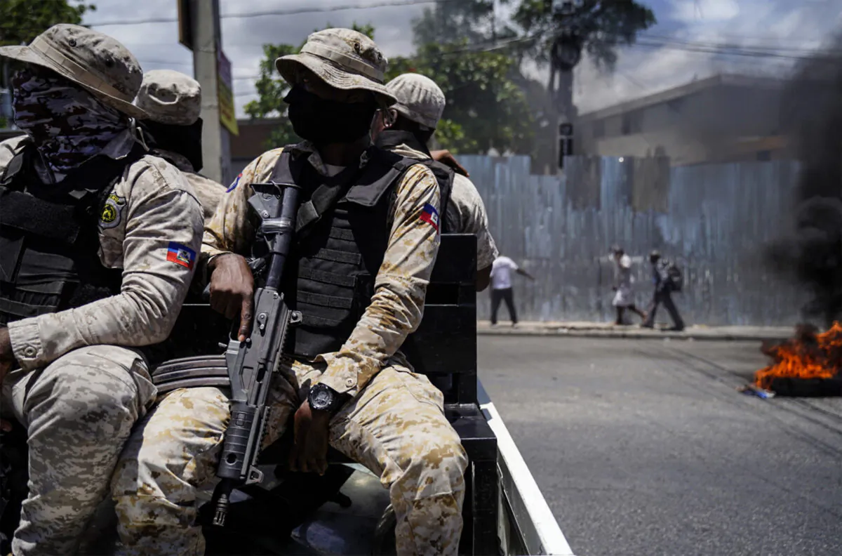 Armed police patrol in Haiti in a file photo. (Richard Pierrin/AFP via Getty Images)